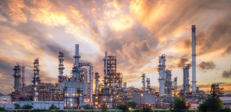 Refinery towers and processing units at dusk